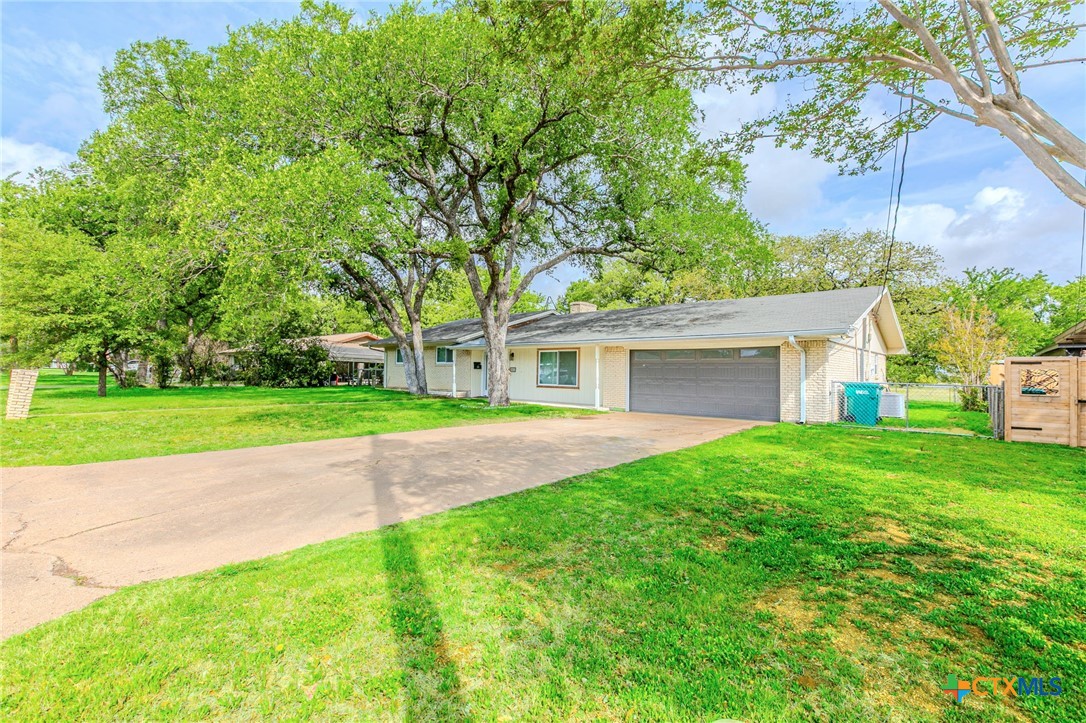 2411 Osage Road Gatesville, TX 76528 - Photo 25 of 29 Side yard view with driveway access