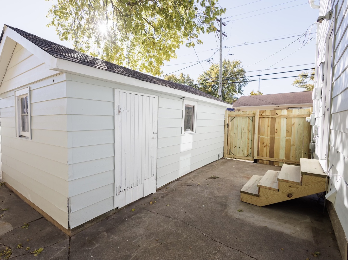 1240 West Merchant Street Kankakee, IL 60901 - Photo 23 of 25 a view of a house with backyard