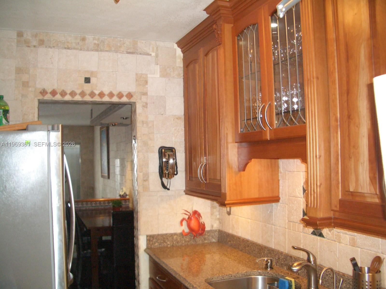 10900 Southwest 104th Street, Unit 324 Miami, FL 33176 - Photo 1 of 34 a bathroom with a sink vanity and a mirror