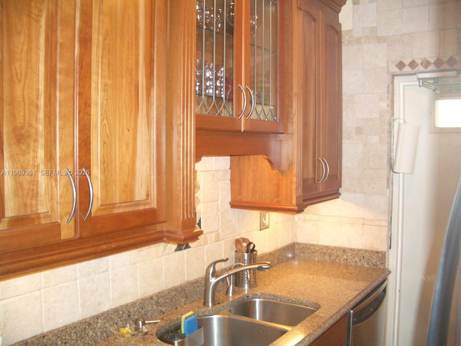 10900 Southwest 104th Street, Unit 324 Miami, FL 33176 - Photo 16 of 34 a bathroom with a sink and a mirror