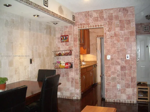 a dining room with furniture and a table