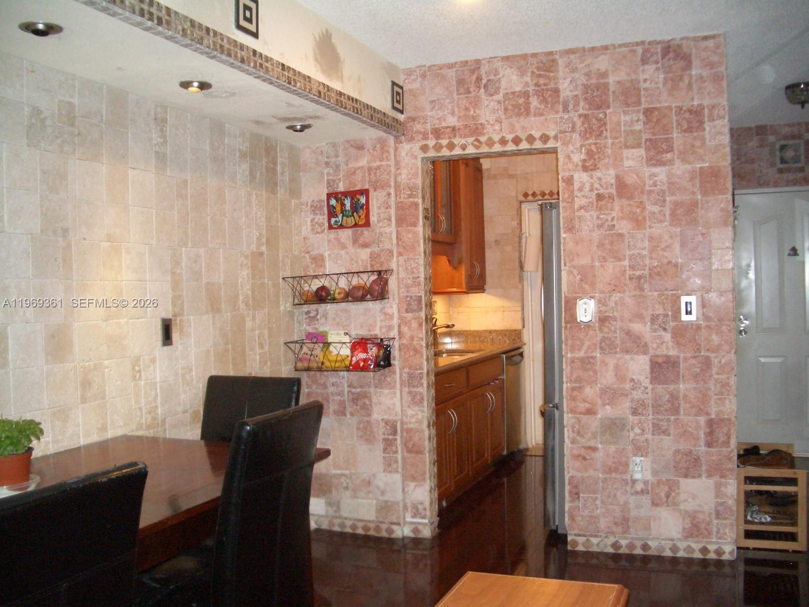 10900 Southwest 104th Street, Unit 324 Miami, FL 33176 - Photo 18 of 34 a dining room with furniture and a table