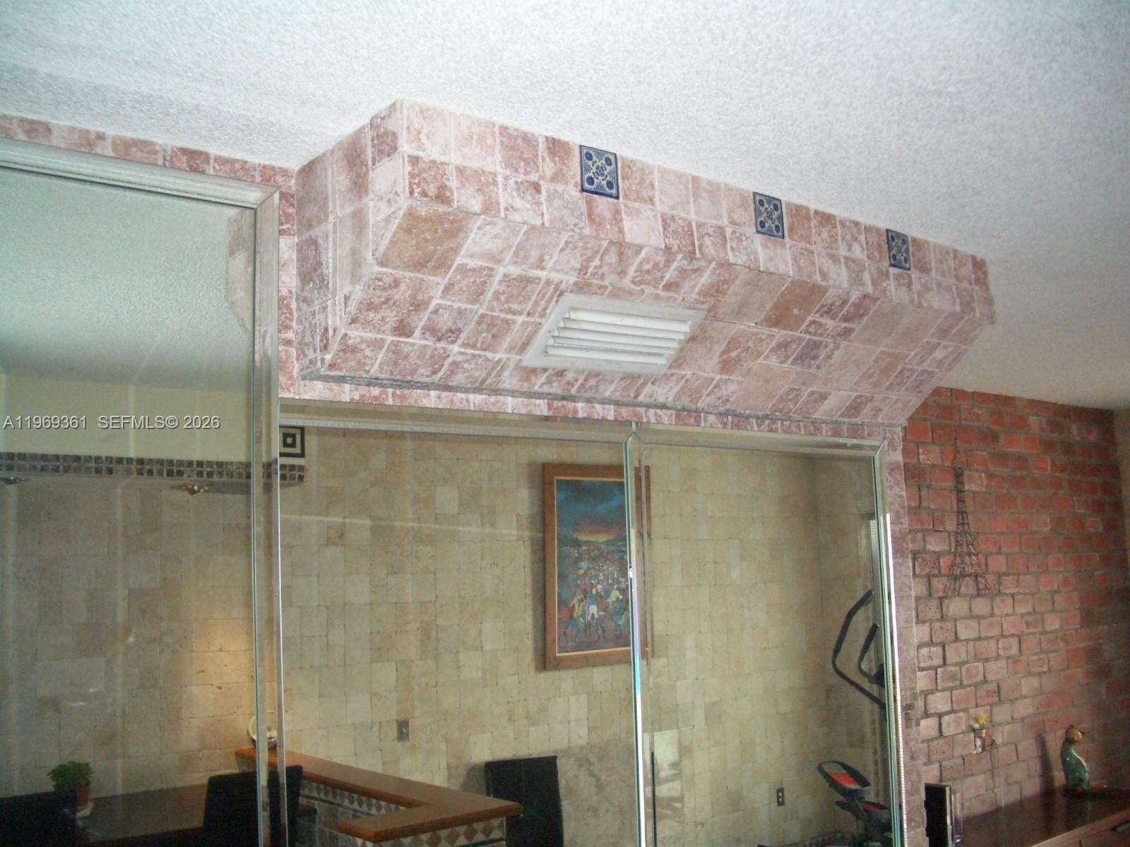 10900 Southwest 104th Street, Unit 324 Miami, FL 33176 - Photo 20 of 34 a bathroom with a granite countertop sink and a mirror