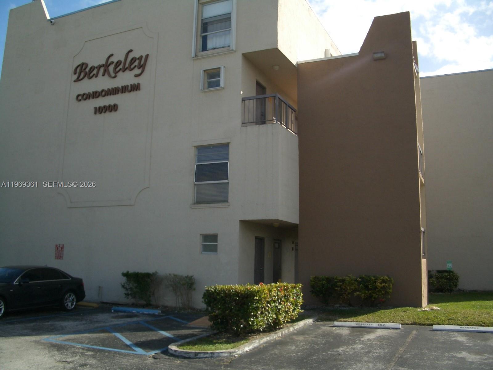 10900 Southwest 104th Street, Unit 324 Miami, FL 33176 - Photo 22 of 34 a front view of a house with garden