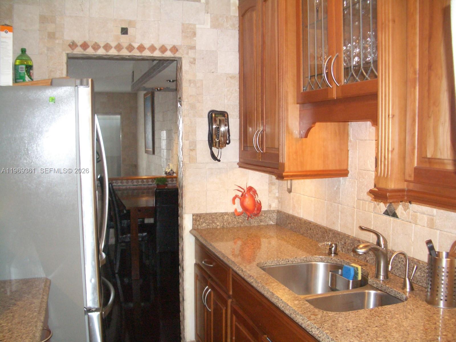 10900 Southwest 104th Street, Unit 324 Miami, FL 33176 - Photo 33 of 34 a bathroom with a sink and a mirror