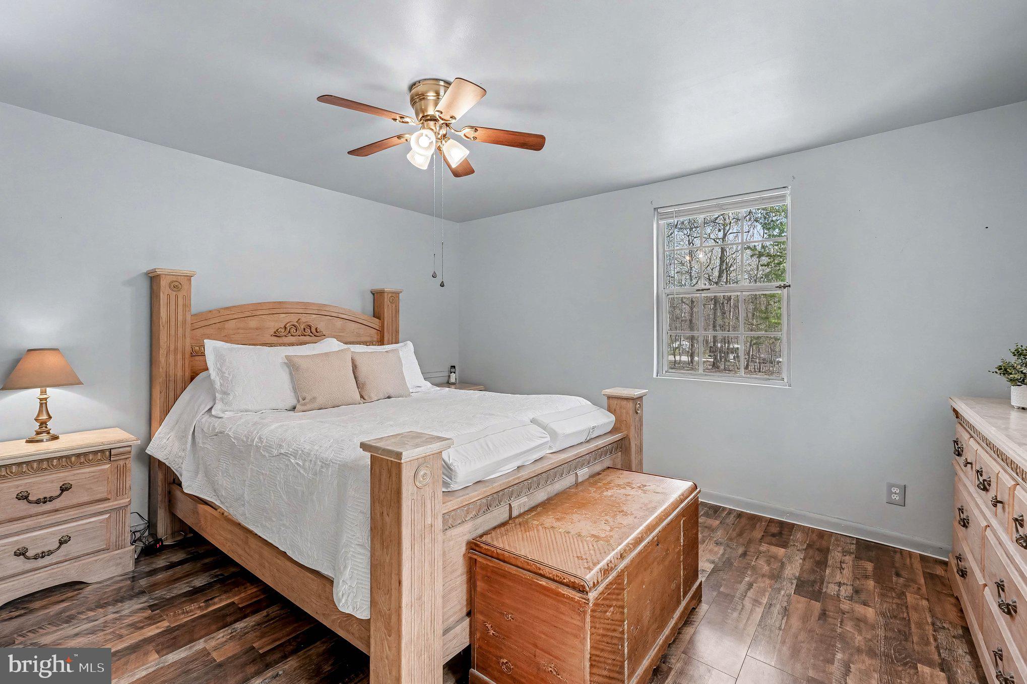 3440 Van Buren Road Burr Hill, VA 22433 - Photo 11 of 24 a bedroom with bed and window