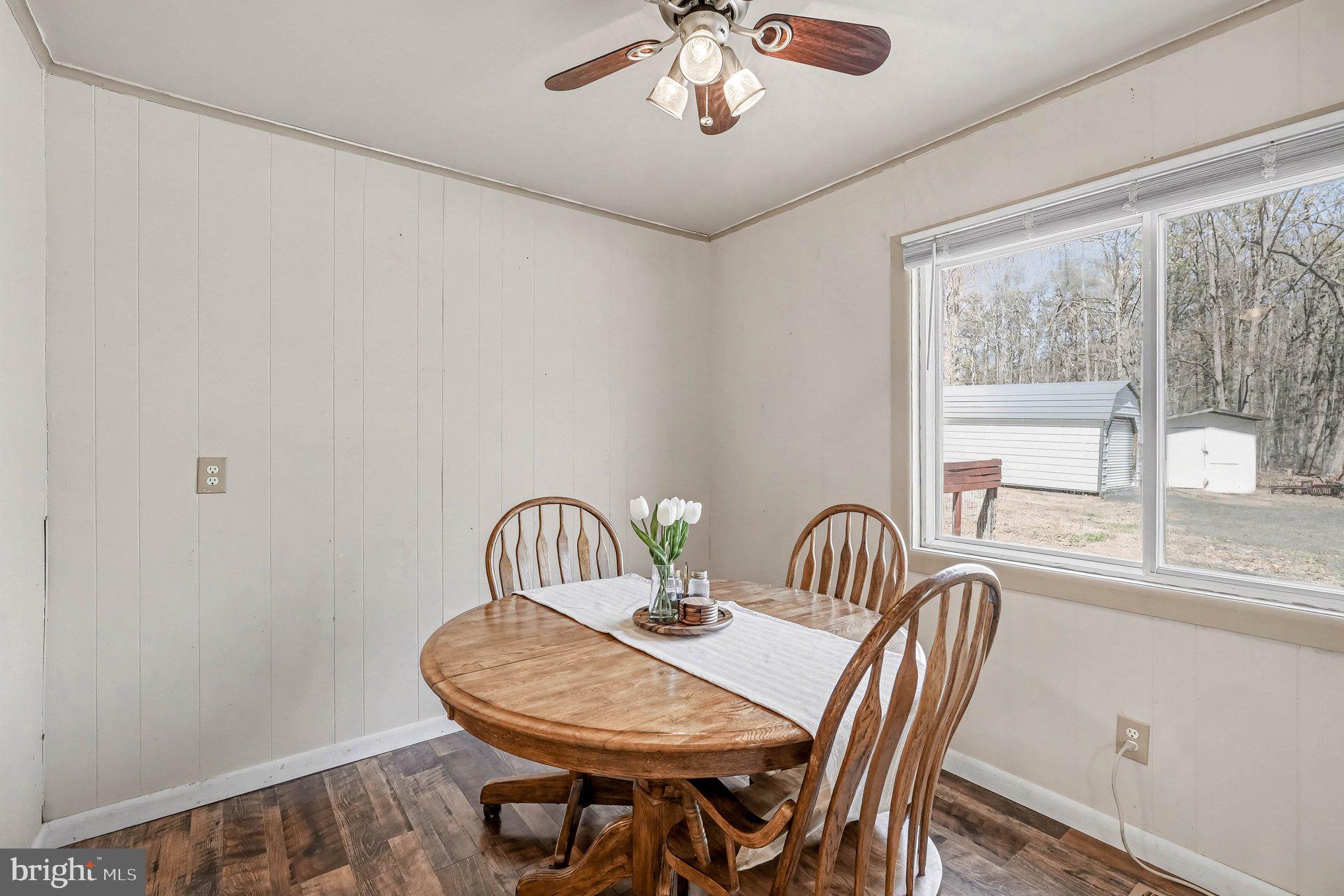 3440 Van Buren Road Burr Hill, VA 22433 - Photo 8 of 24 a view of a dining room with furniture window and outside view