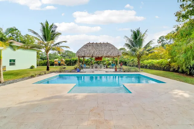 a view of outdoor space swimming pool and seating