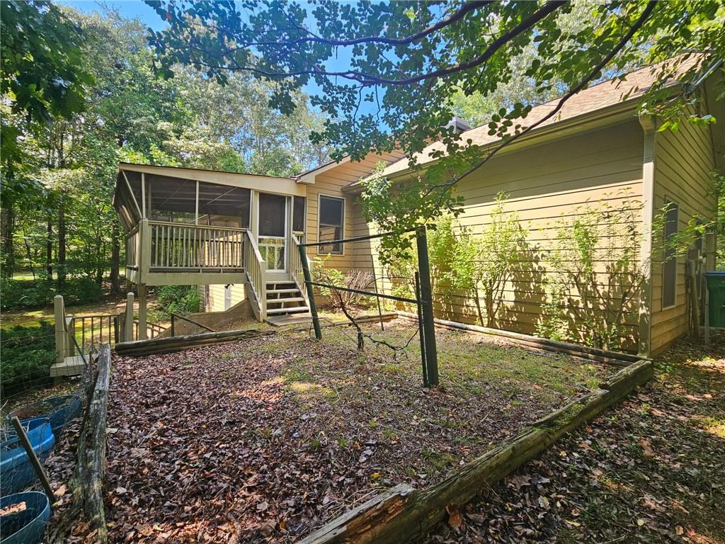 90 Chimney Sweep Trail Fairmount, GA 30139 - Photo 13 of 42 a view of a house with backyard