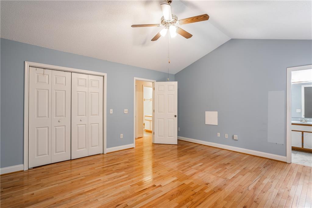90 Chimney Sweep Trail Fairmount, GA 30139 - Photo 26 of 42 a view of empty room with wooden floor and fan