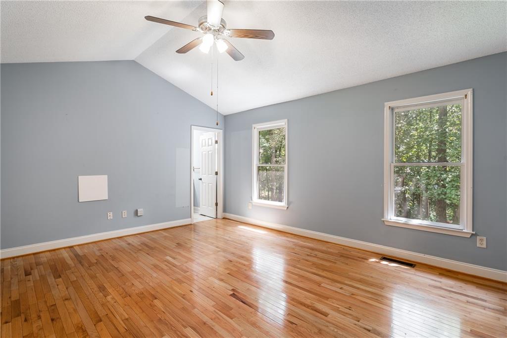 90 Chimney Sweep Trail Fairmount, GA 30139 - Photo 27 of 42 a view of an empty room with wooden floor and a window