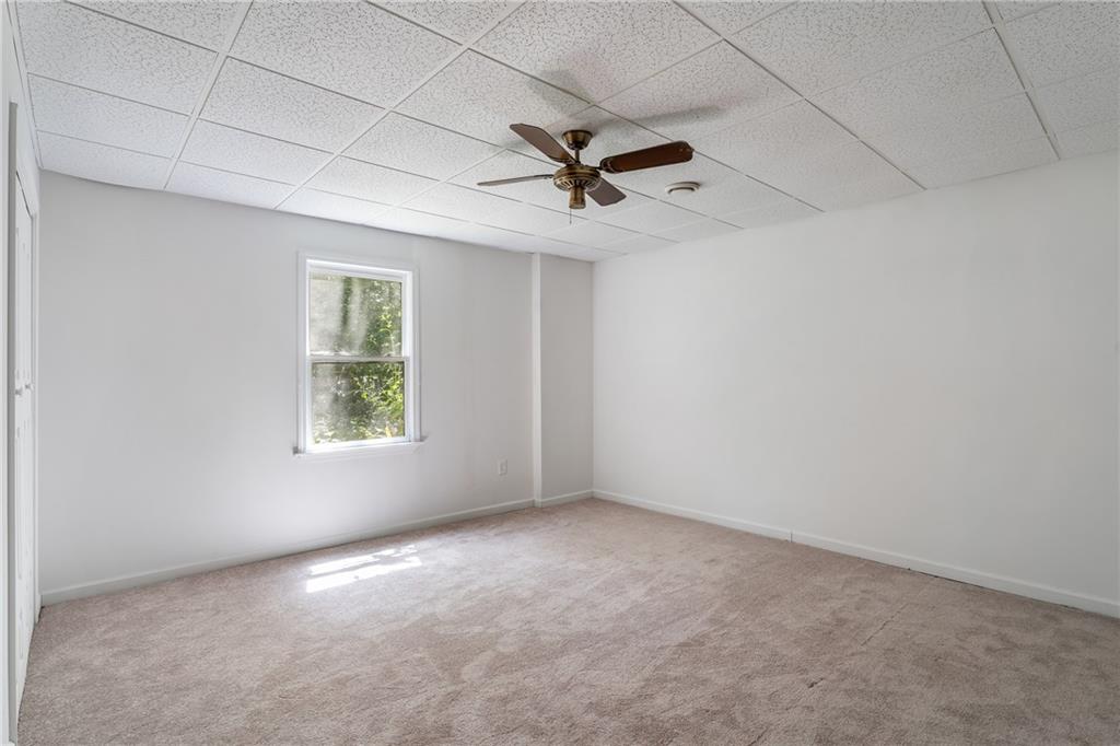 90 Chimney Sweep Trail Fairmount, GA 30139 - Photo 37 of 42 an empty room with windows and fan