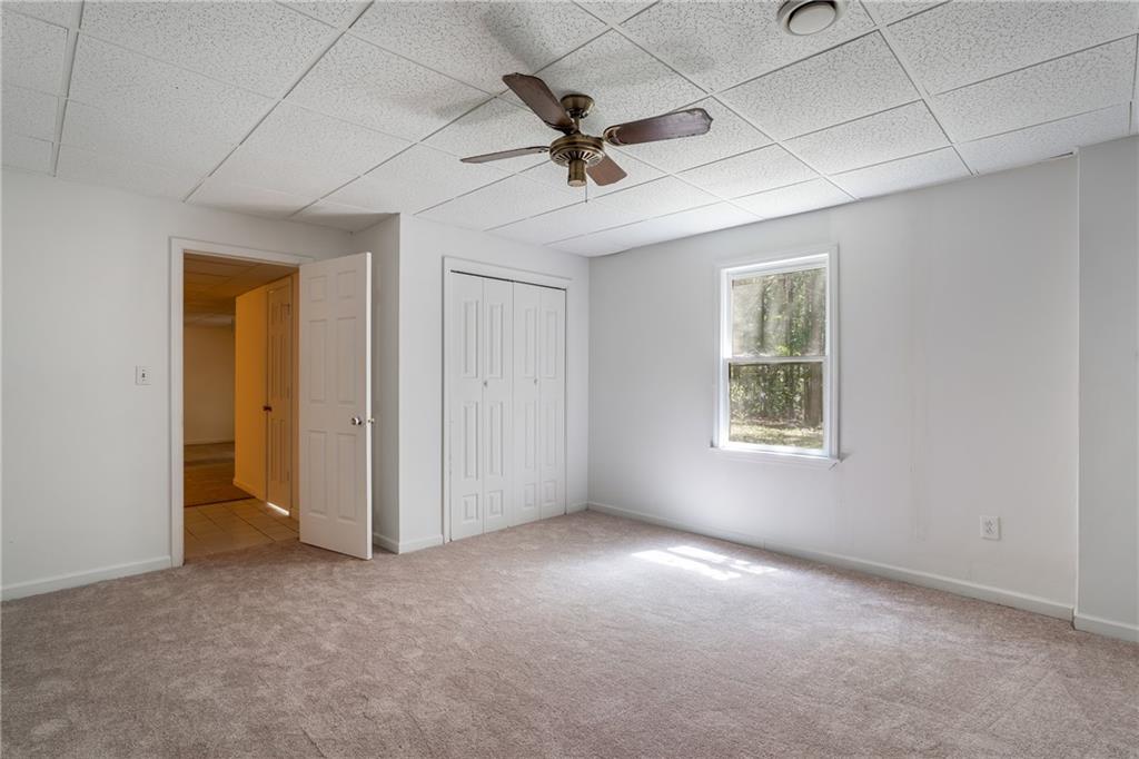 90 Chimney Sweep Trail Fairmount, GA 30139 - Photo 38 of 42 a view of a livingroom with a ceiling fan and window