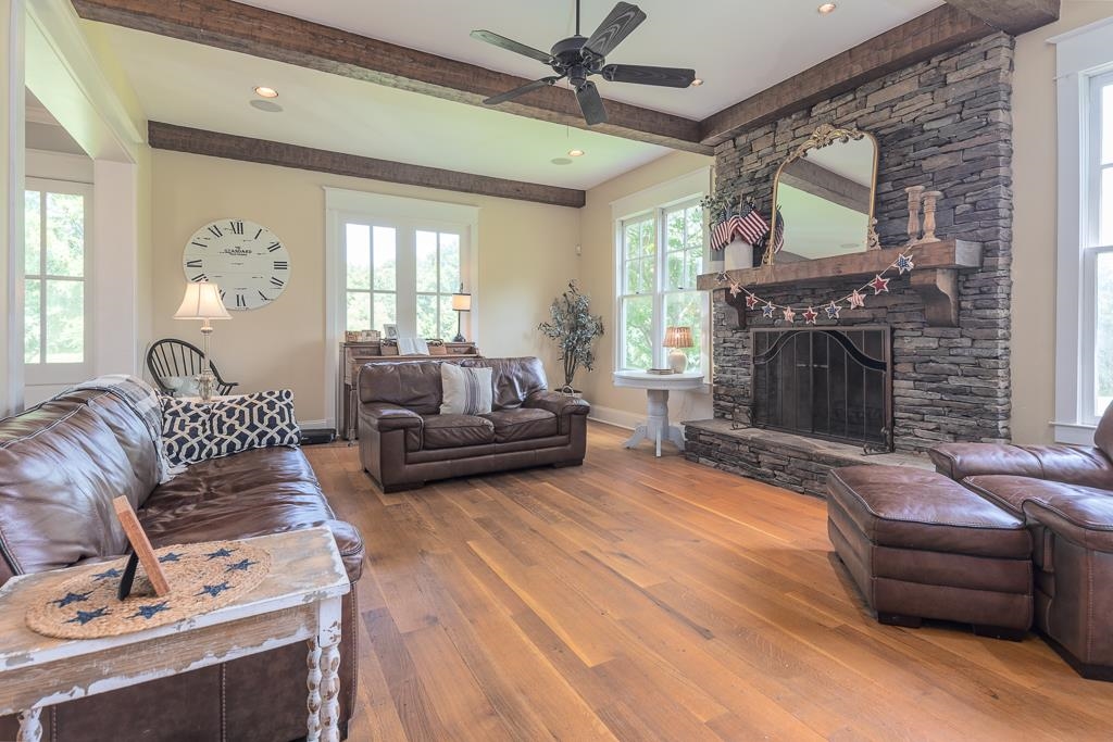 1915 Teague Store Road Somerville, TN 38068 - Photo 22 of 38 Stone-clad fireplace with a substantial wood mantel