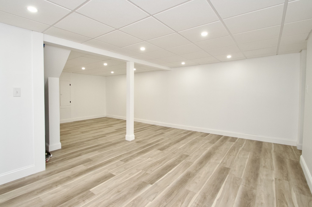 7 Barbara Road Kingston, MA 02364 - Photo 17 of 26 a view of an empty room with wooden floor