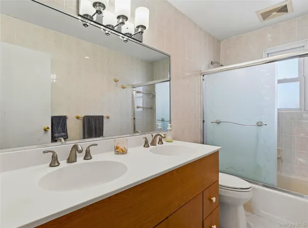 $985,000 | 64-09 Bell Boulevard | Oakland Gardens
