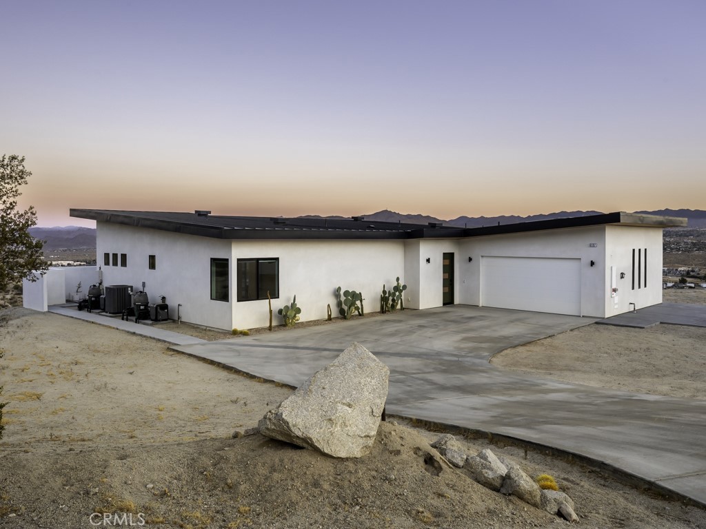 6197 Mandarin Road Yucca Valley, CA 92284 - Photo 1 of 1 a house view with a outdoor space