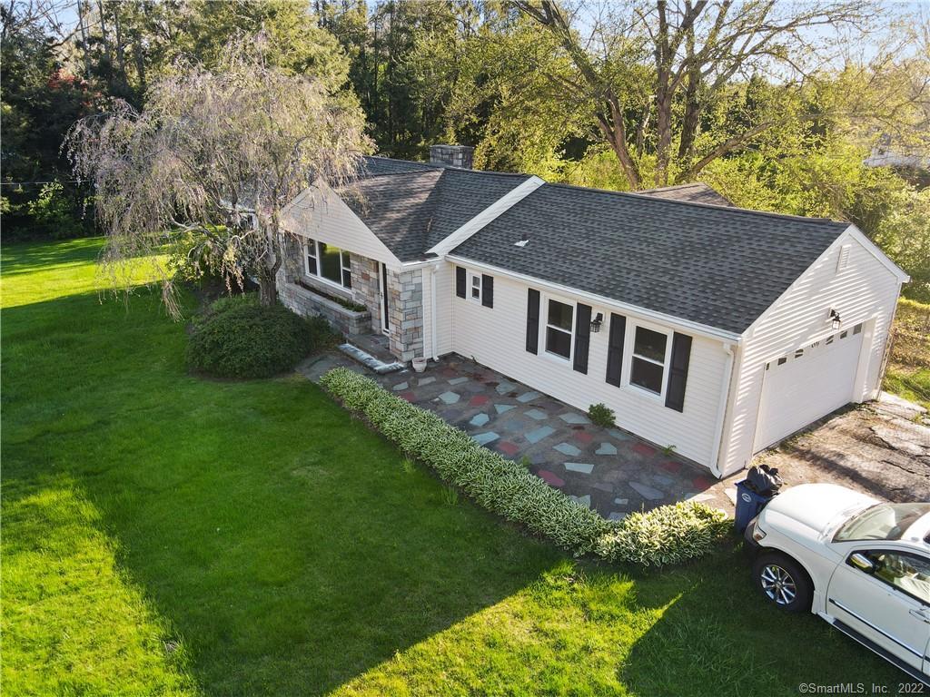 484 Ridge Road Orange, CT 06477 - Photo 1 of 1 a aerial view of a house with a yard