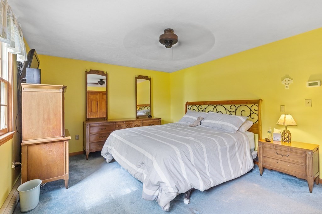 45 Leonard Road Marshfield, MA 02050 - Photo 15 of 20 a bedroom with a bed and a dresser