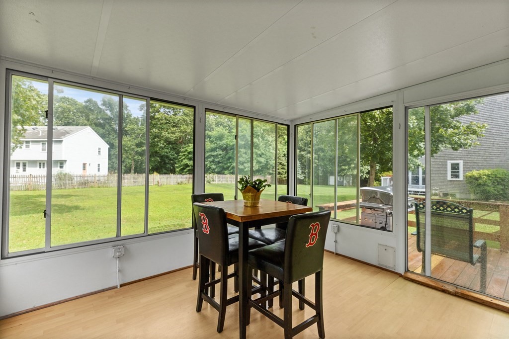 45 Leonard Road Marshfield, MA 02050 - Photo 20 of 20 a table and chairs in a room with a large window