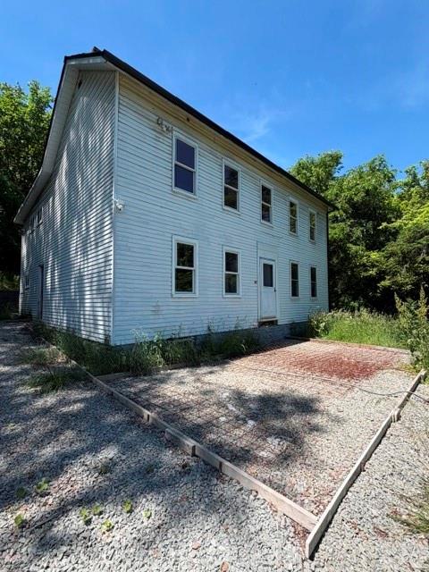 55 Pumpkin Center Road Finleyville, PA 15332 - Photo 1 of 29 a front view of a house with a yard