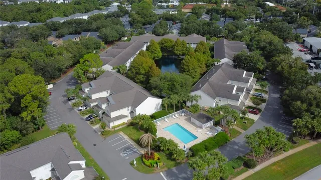 an aerial view of a house with a garden