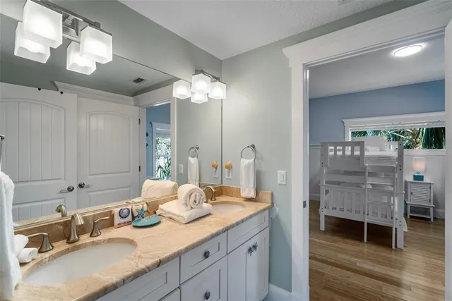 a bathroom with a toilet and a shower curtain