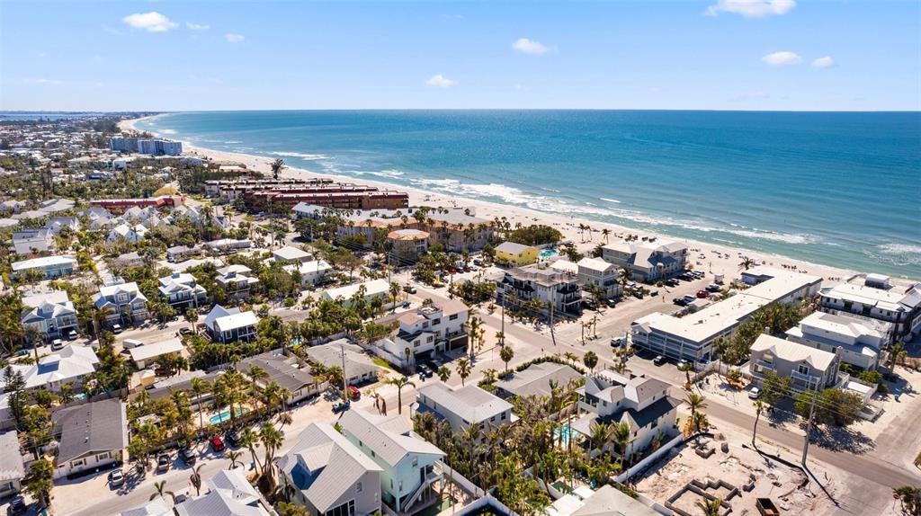 204 66th Street Holmes Beach, FL 34217 - Photo 4 of 53 an aerial view of beach and ocean