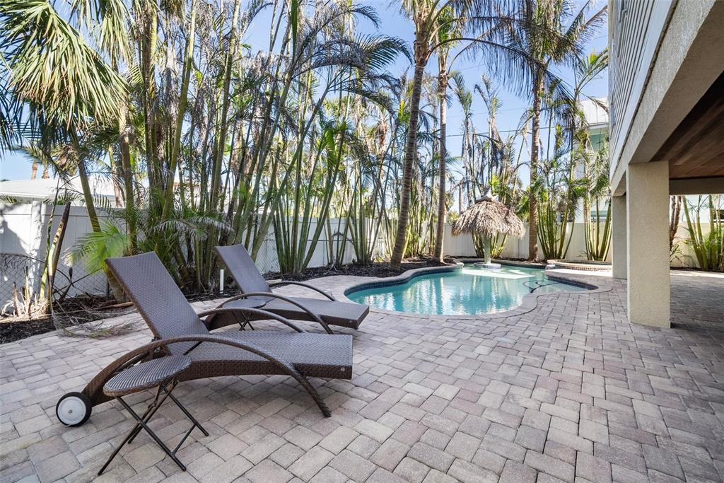 204 66th Street Holmes Beach, FL 34217 - Photo 46 of 53 a view of a backyard with sitting area