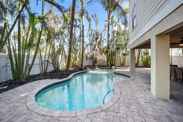 a view of a livingroom with furniture and a window