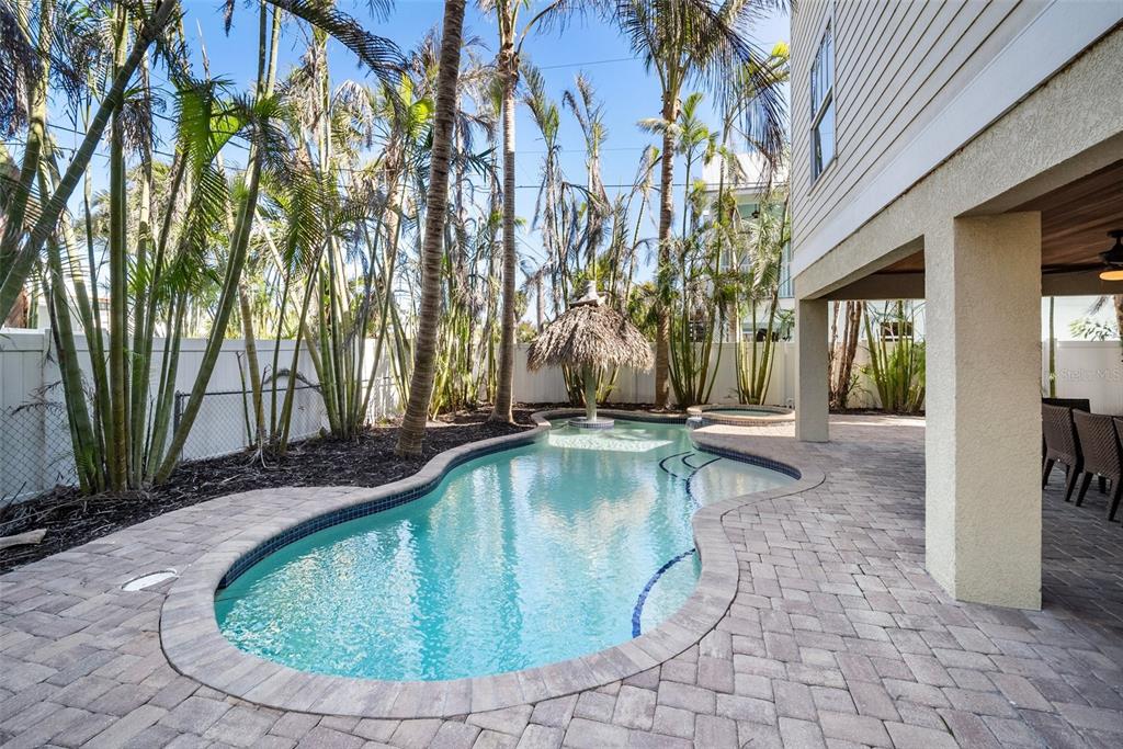 204 66th Street Holmes Beach, FL 34217 - Photo 49 of 53 a view of outdoor space yard deck patio and swimming pool