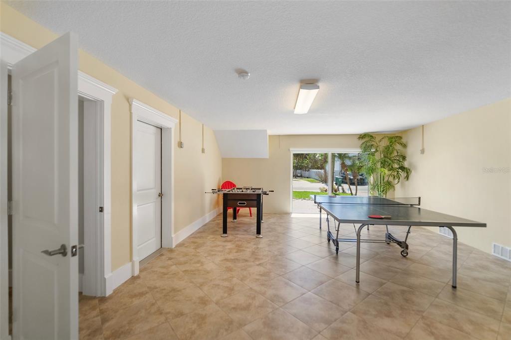 204 66th Street Holmes Beach, FL 34217 - Photo 51 of 53 a view of a livingroom with furniture and a window