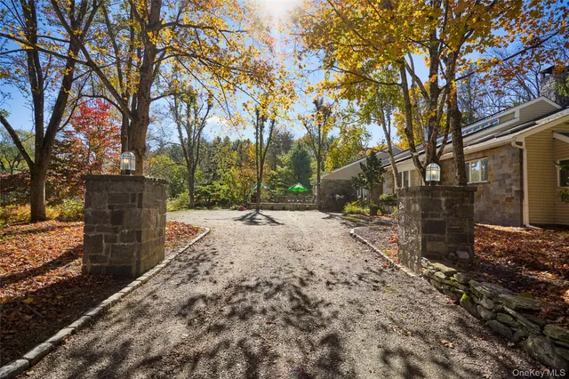 a house with a tree in front of it