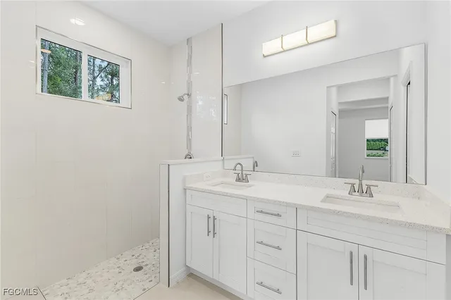 a bathroom with a sink a toilet and a bathtub