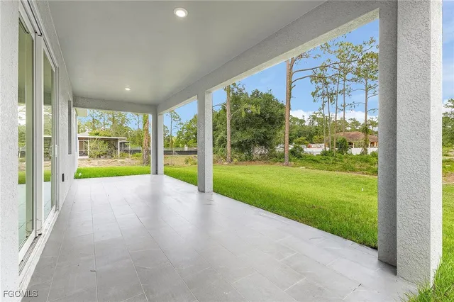 a aerial view of a house with a yard