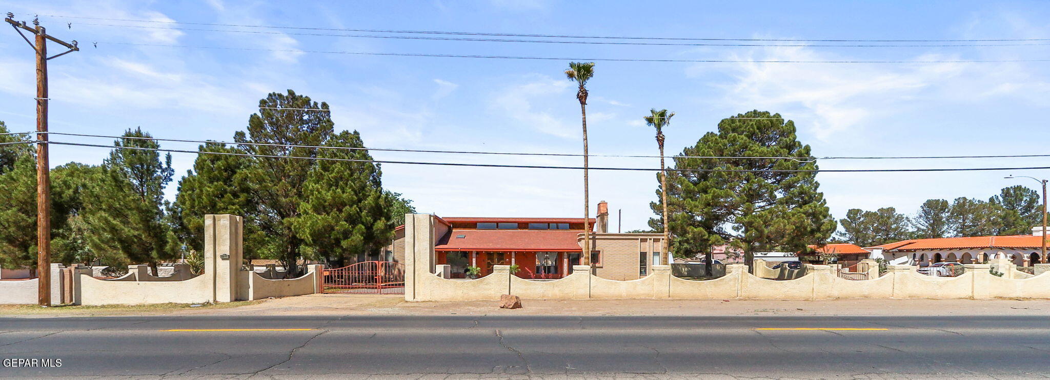 a view of a tall building from a street
