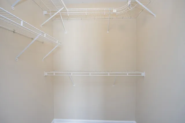a view of a room with racks on the wall