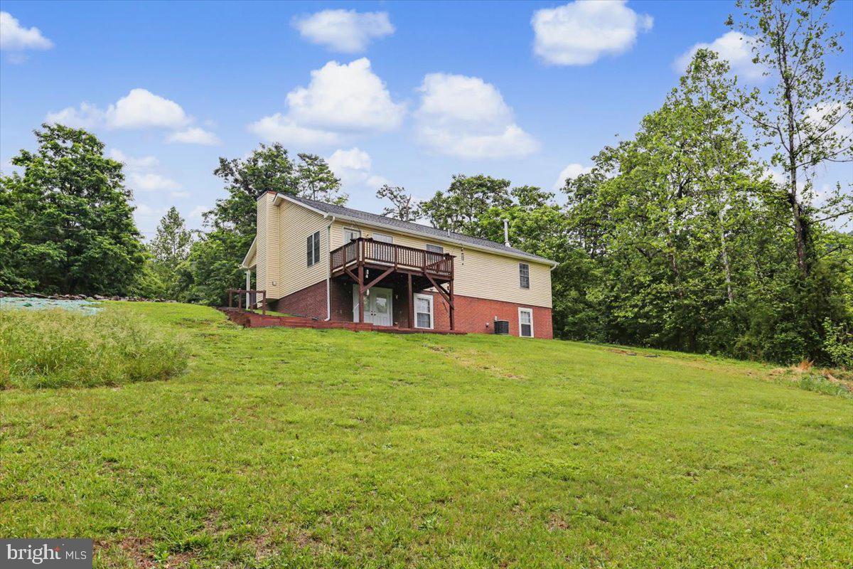 543 Whiskey Still Road Linden, VA 22642 - Photo 23 of 23 a house view with a garden space
