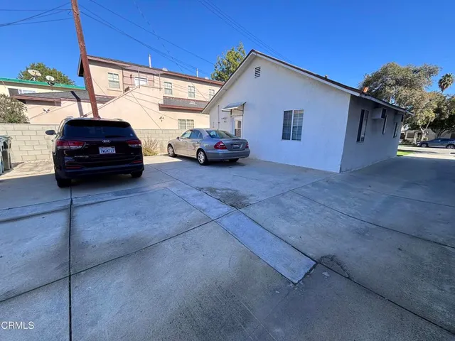 a car parked in front of a house