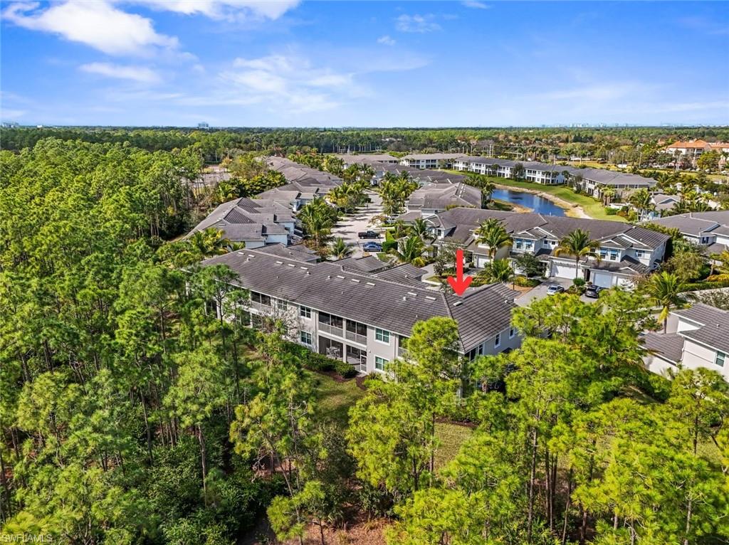 6973 Avalon Circle, Unit 1406 Naples, FL 34112 - Photo 33 of 36 Bird's eye view of a nearby body of water