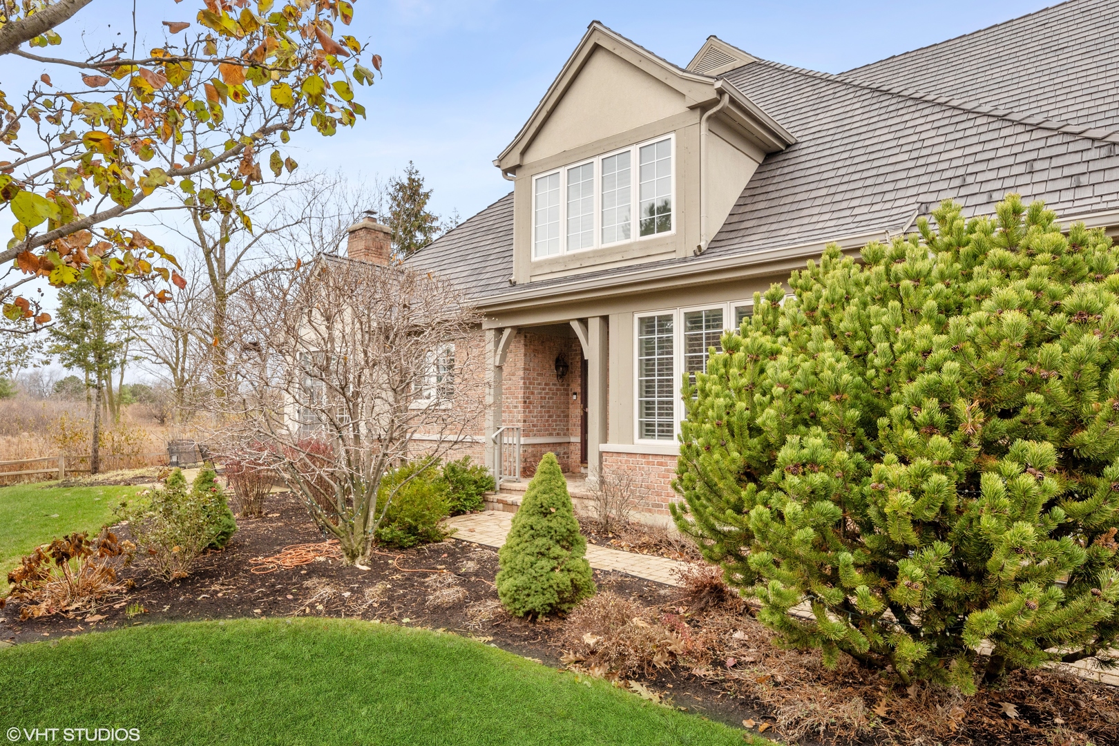 432 Fox Meadow Drive Northfield, IL 60093 - Photo 1 of 33 a front view of a house with garden