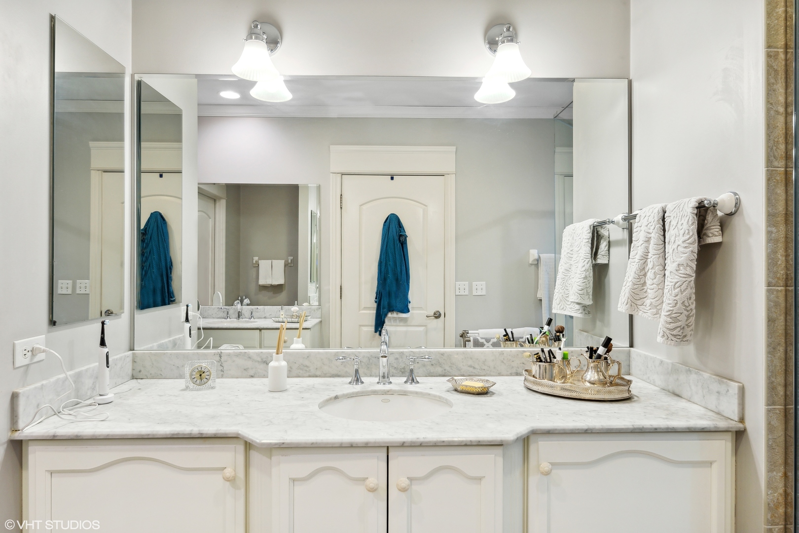 432 Fox Meadow Drive Northfield, IL 60093 - Photo 16 of 33 a bathroom with a granite countertop sink and a mirror