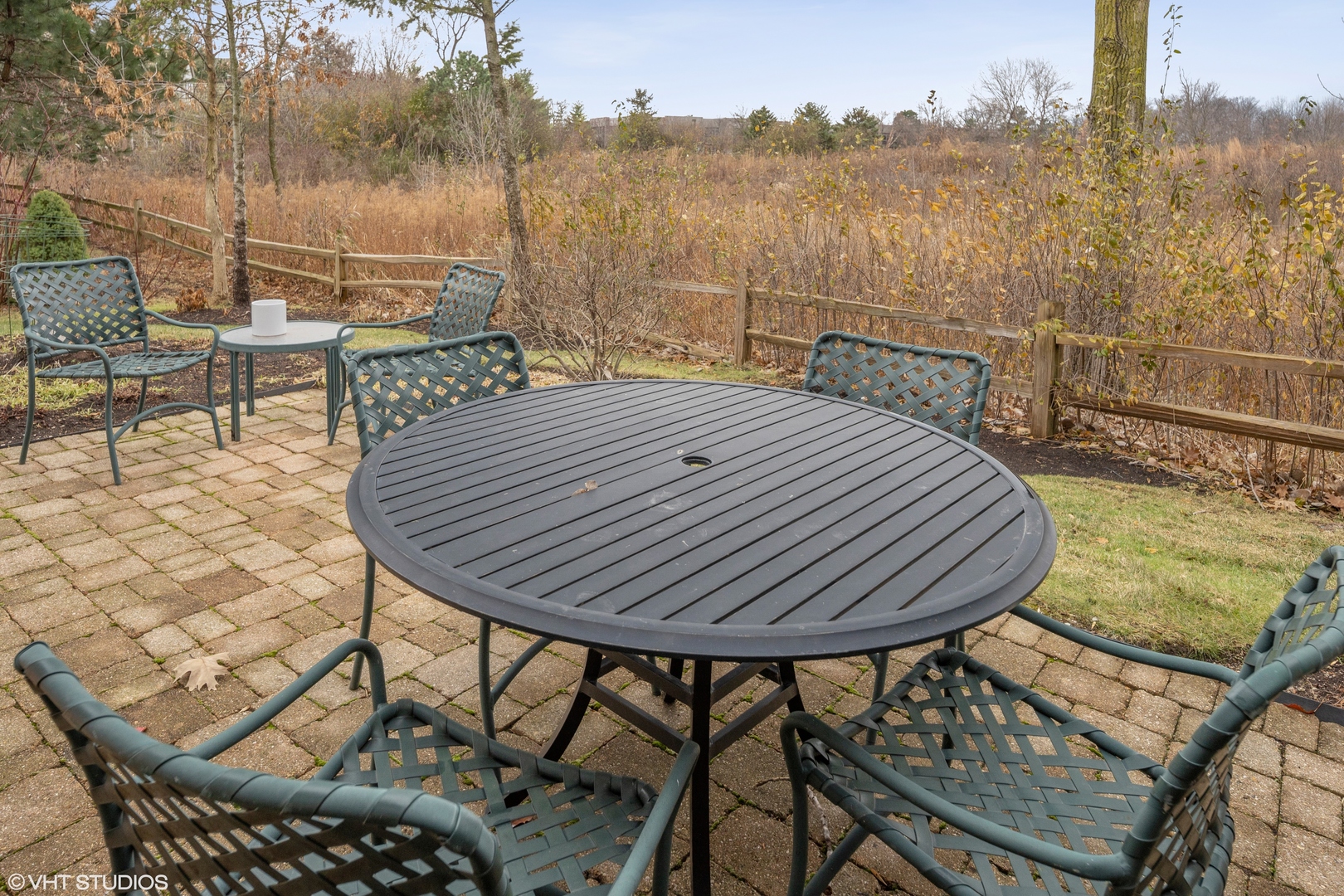432 Fox Meadow Drive Northfield, IL 60093 - Photo 28 of 33 a roof deck with chairs and wooden fence