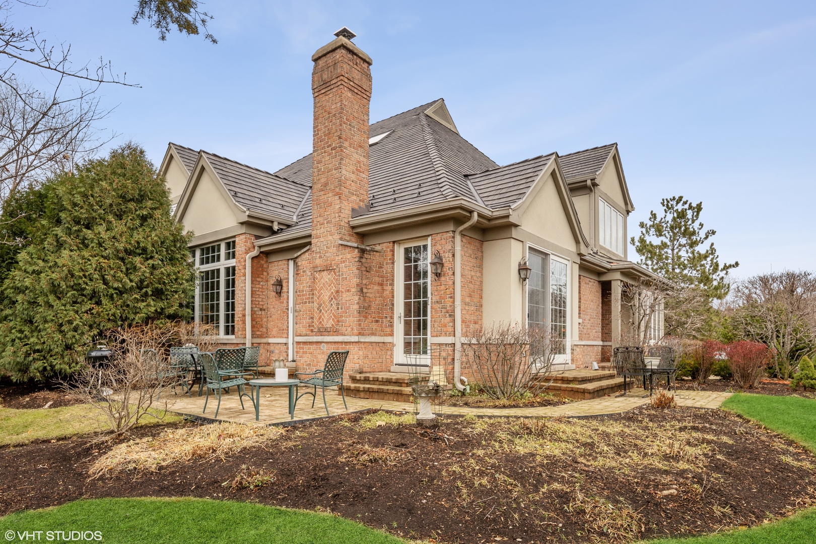 432 Fox Meadow Drive Northfield, IL 60093 - Photo 29 of 33 a front view of a house with garden