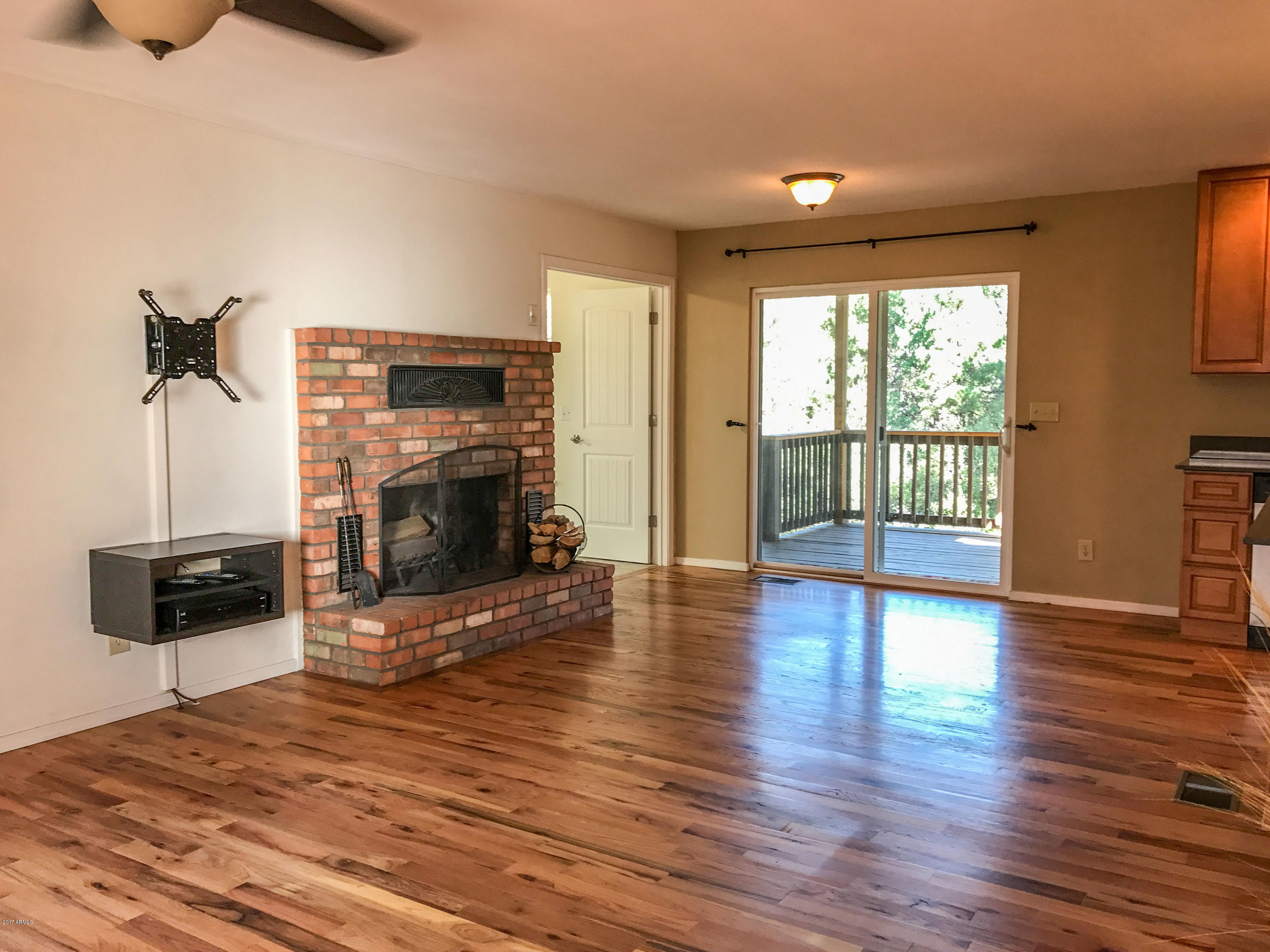 1208 North Matterhorn Road Payson, AZ 85541 - Photo 8 of 23 Living area with wood stove