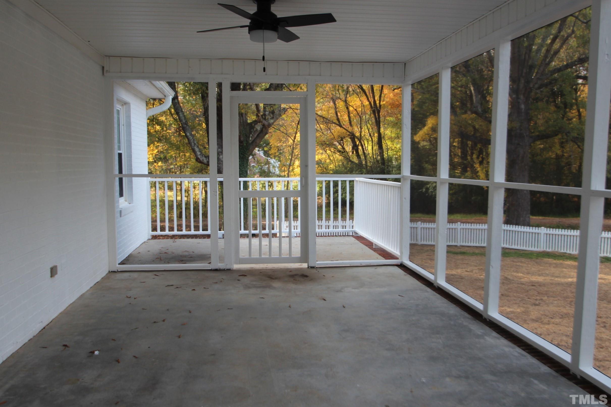 895 Oxford Road Roxboro, NC 27574 - Photo 11 of 23 a view of an empty room with a window