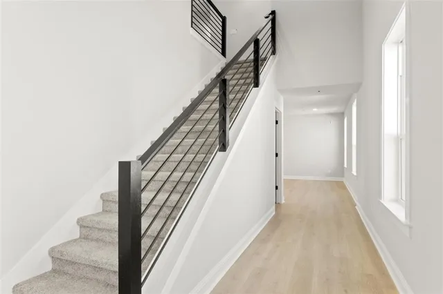 a view of a hallway with staircase