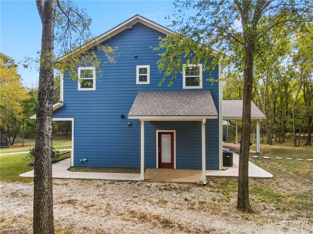 275 Woodruff Road Waco, TX 76705 - Photo 38 of 42 a front view of a house with garden