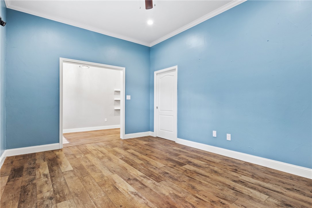 275 Woodruff Road Waco, TX 76705 - Photo 8 of 42 a view of an empty room with wooden floor