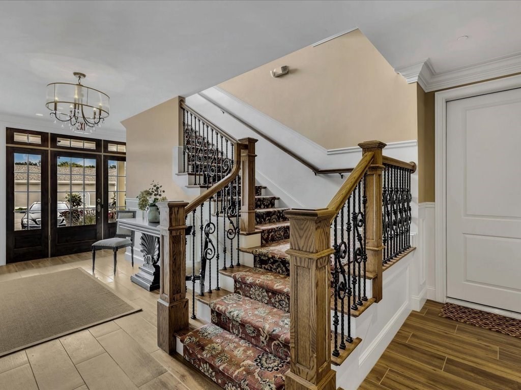 70 Simons Road, Unit C Mashpee, MA 02649 - Photo 23 of 23 a view of entryway and hall with wooden floor